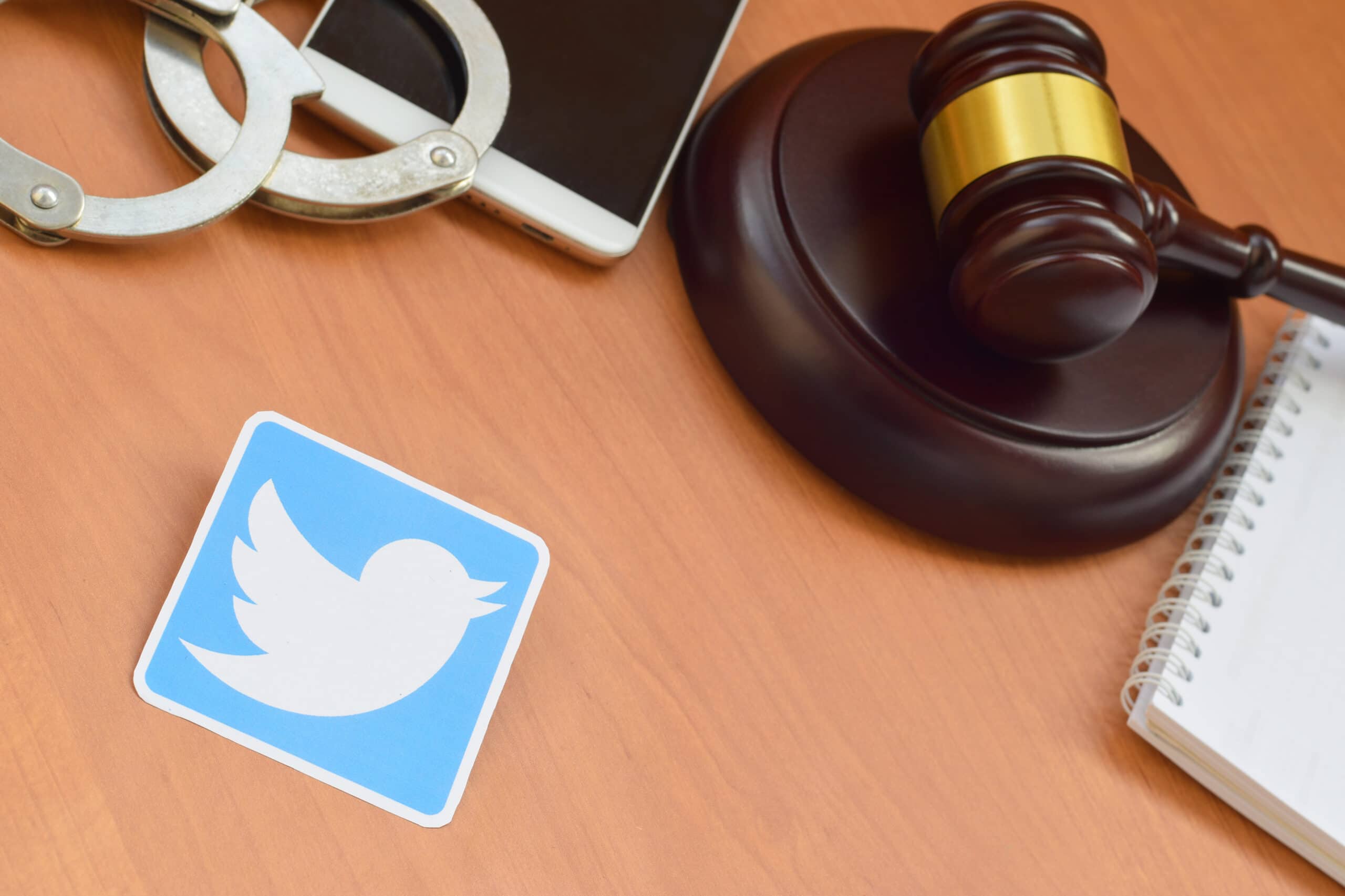 Paper and Wooden Judge Gavel on desk.